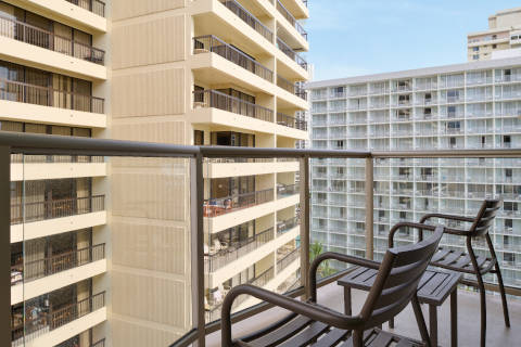 All rooms come with a balcony and seating area to enjoy views of Waikiki, even the standard hotel room at the Aston Waikiki Circle Hotel