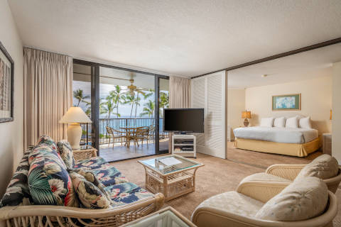 Two-Bedroom Ocean View living room with sliding doors to the maser bedroom