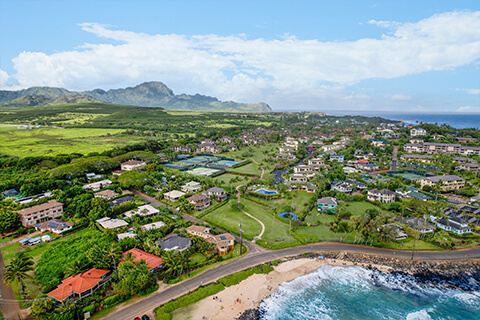 Overhead view of resort, mountains, and beach
