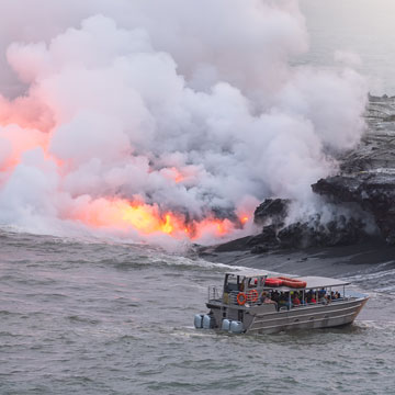 Boat tour watching lava flow into the ocean