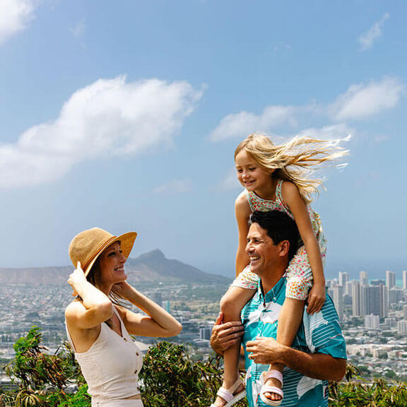 Family enojoying view of Honolulu and Diamond Head