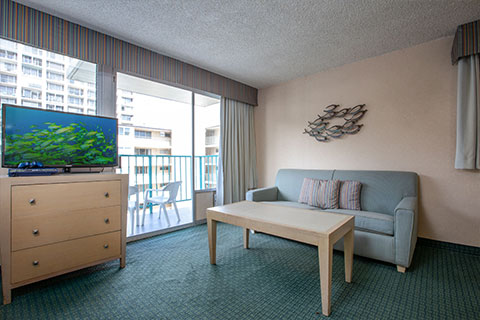 Aqua-Aloha-Surf-Waikiki-Deluxe-Room-with-Balcony-Living-Area-2-480x320.jpg