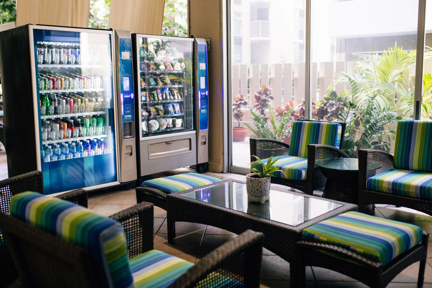 Vending machines in the lobby with a lot of comfortable seating 