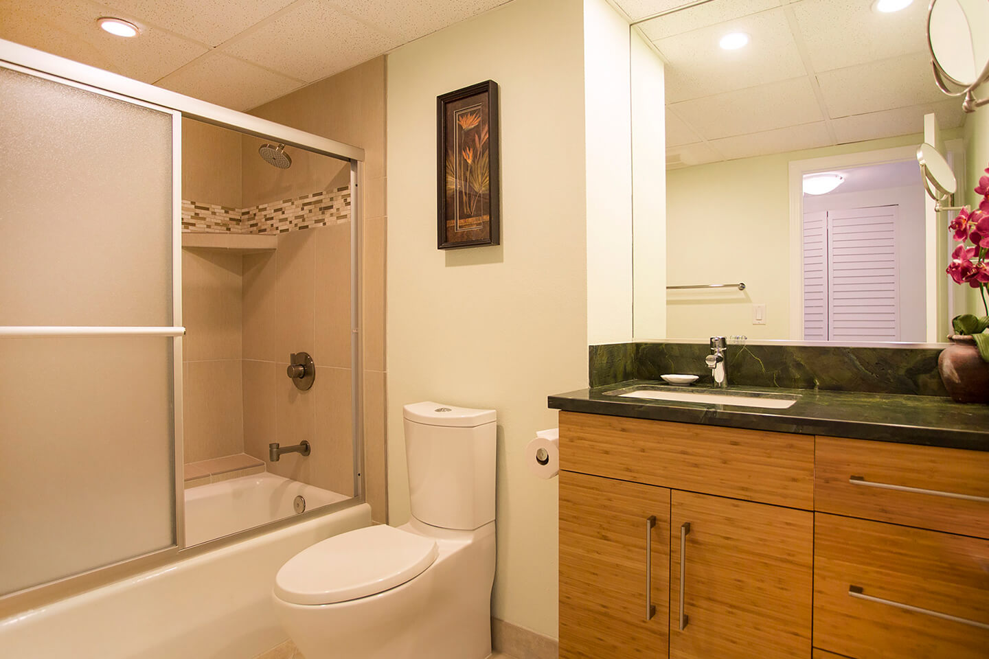 Bathroom with a shower, tub, toilet, and sink.