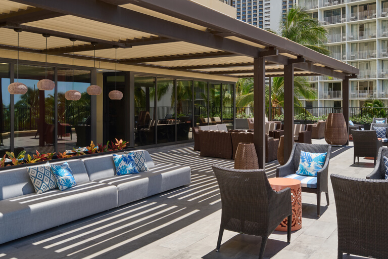Seating and tables on open-air deck