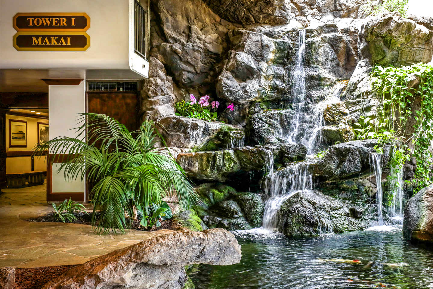Lobby area with a waterfall. 
