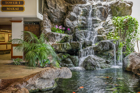 Lobby with rock waterfall. 