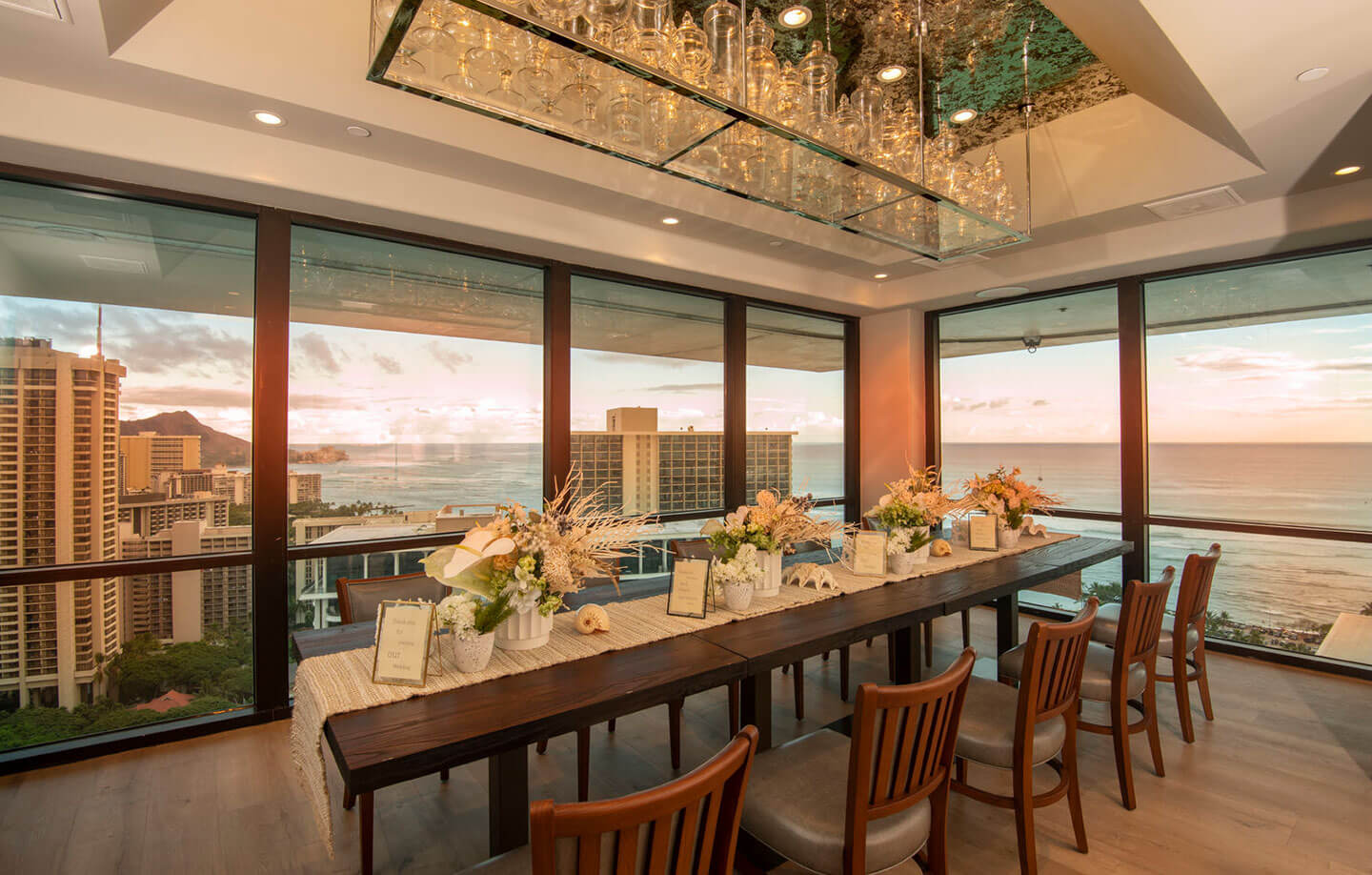 Formal dining set up and decor with Diamond Head and ocean views