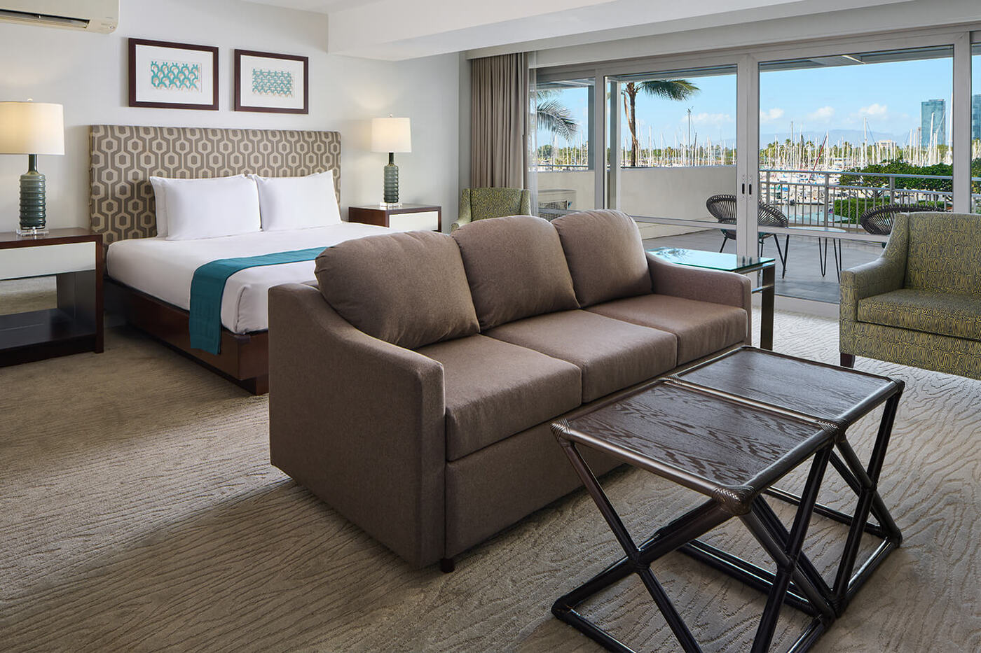 Luxury Junior Suite Partial Ocean View Bedroom and Living Area