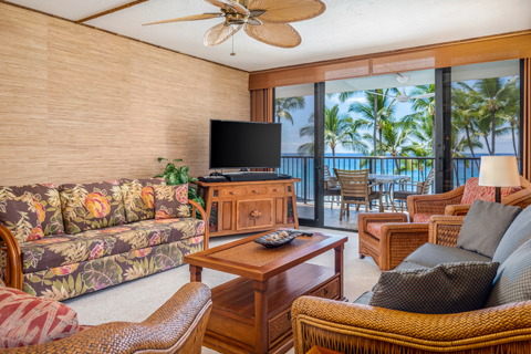 Room with bed, table, chairs, nightstand, lamp, balcony