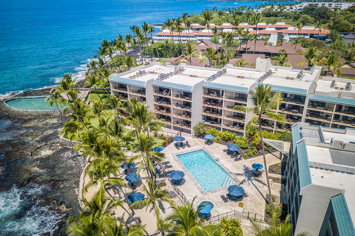 Scenic view of Aston Kona by the Sea, nestled along the Pacific Ocean.