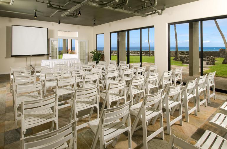 Beach Club Meeting Room at Aston Kona by the Sea, with chairs set up theater-style.