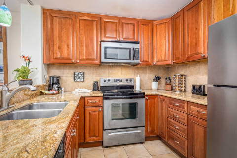 Two bedroom oceanfront full kitchen with stainless steal oven and matching refrigerator