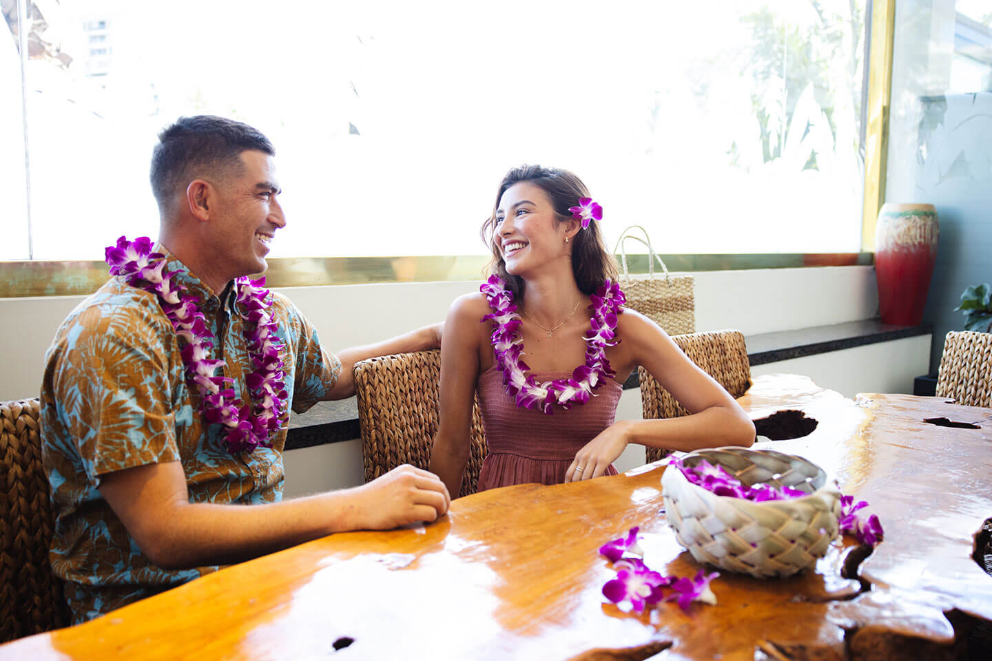 couple making orchid leis