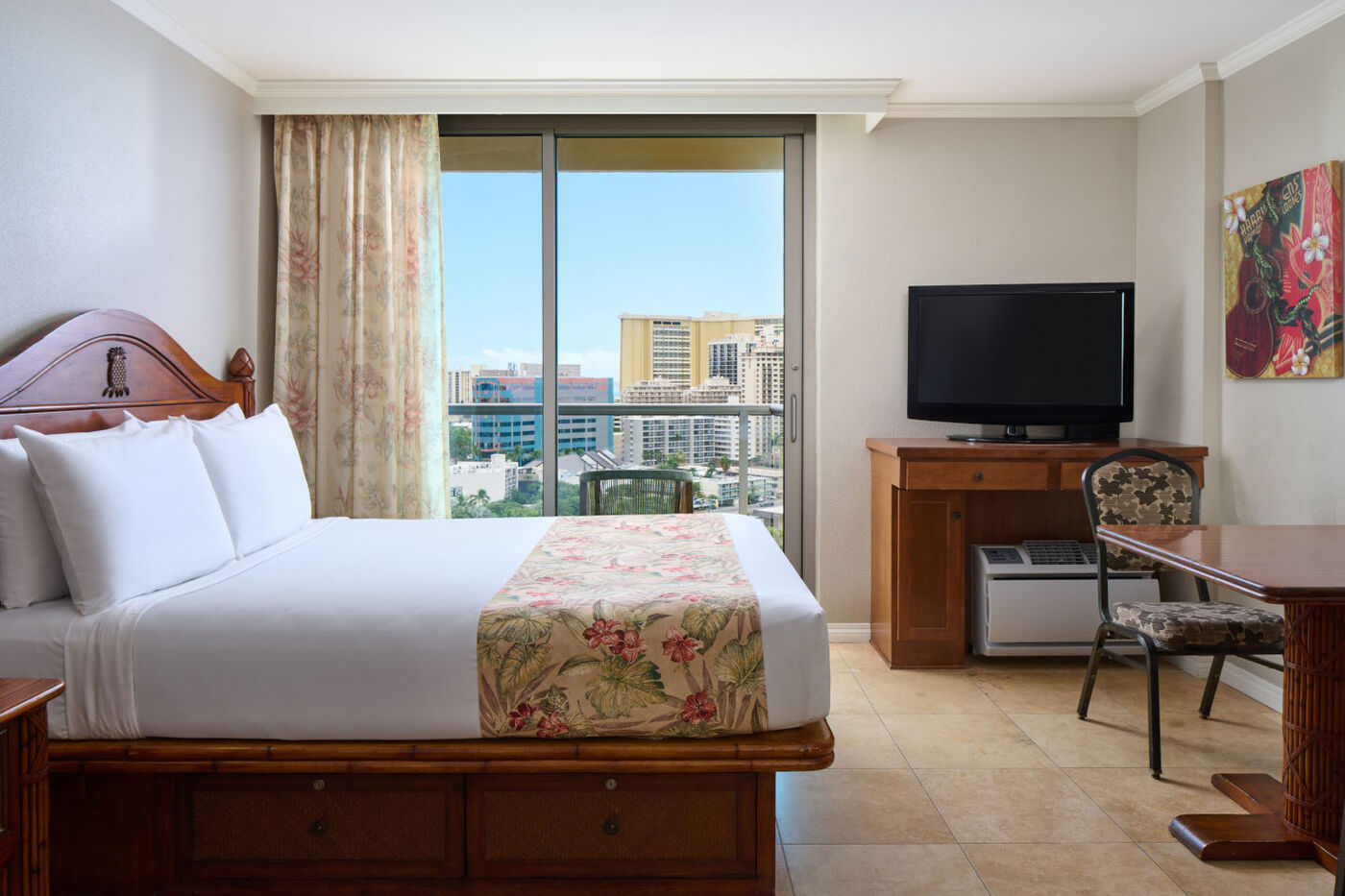 Partial Ocean View Room with a bed, desk, flatscreen TV and a private balcony