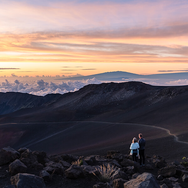 Couple viewing sunrise at Haleakala, Maui
