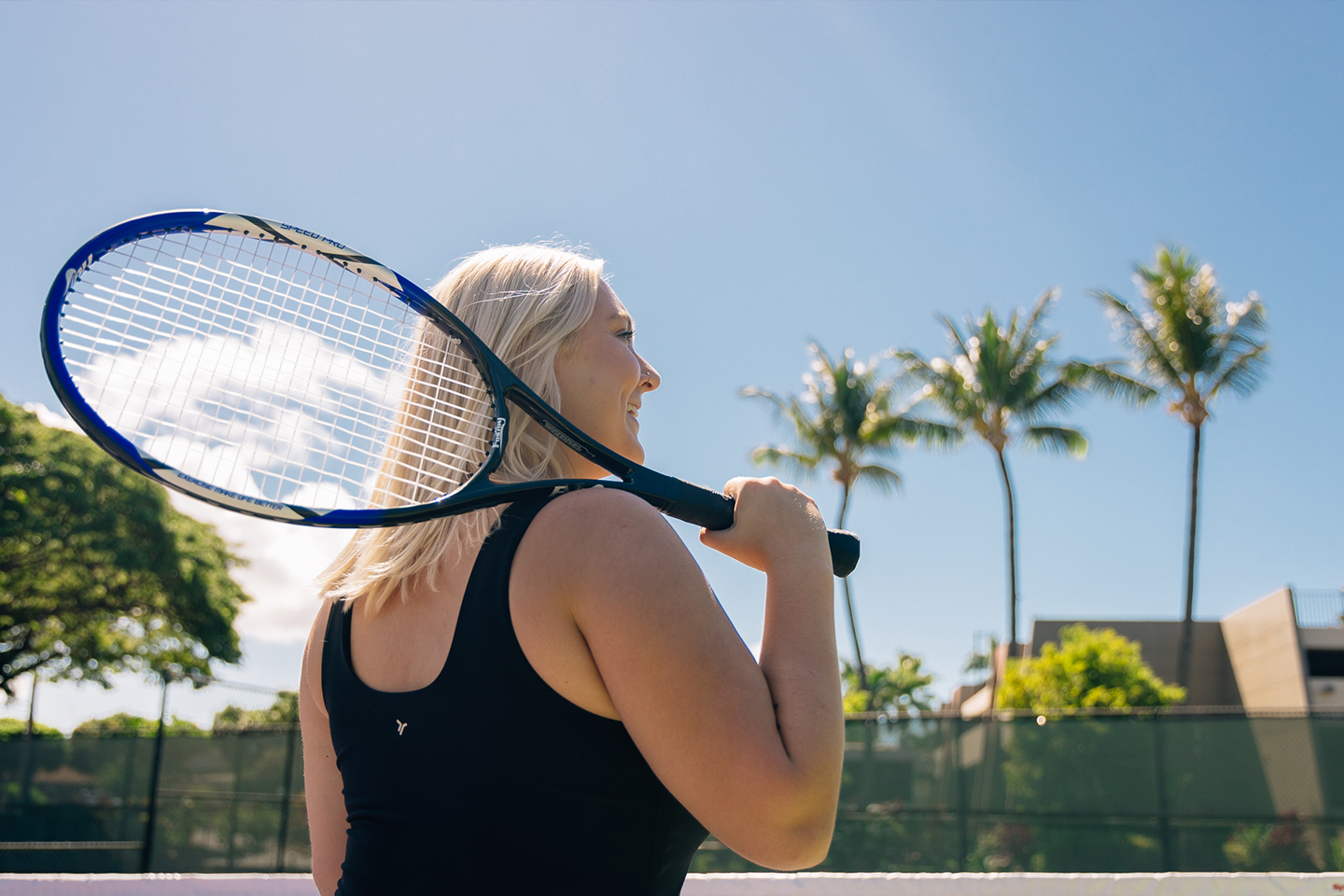 Woman holding tennis raquet