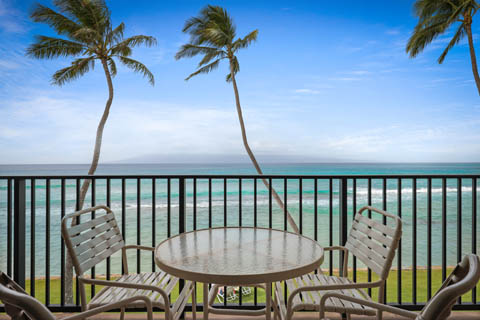 One Bedroom Oceanfront private balcony with seating area 