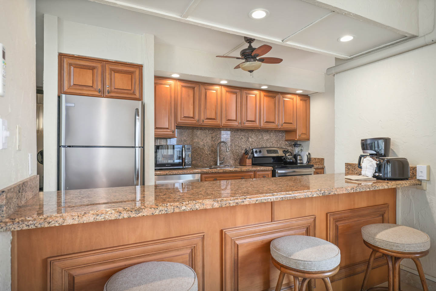 2-Bedroom Oceanfront full kitchen with refrigerator, and stovetop 