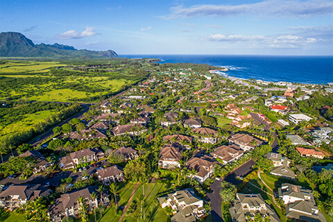 Overhead view of resort, mountains, and ocean