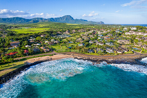 Overhead view of resort, mountains, and beach