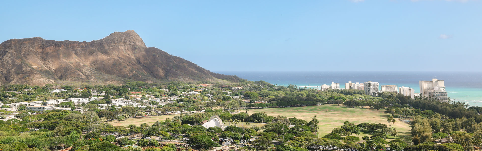 View of Diamond Head Crater and Kapiolani Park with the Pacific Ocean in the horizon