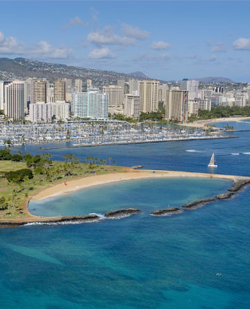 Wide view of Honolulu shoreline buildings and beaches