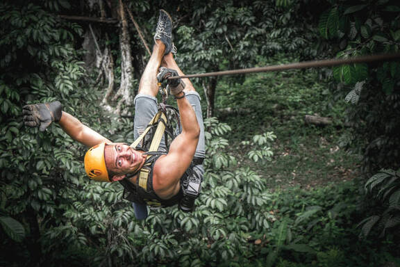 Zipline through the trees in Miramar Canopy Costa Rica